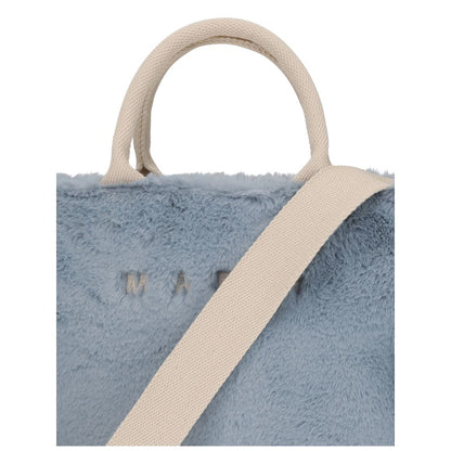 Close-up of Marni Light Blue Polyester Handbag with fur lining and fabric handles.