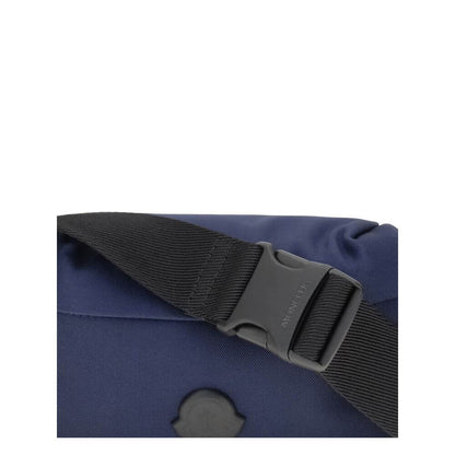 Moncler Blue Nylon Clutch Bag with adjustable belt and metal logo detail for style and functionality.