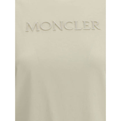 Close-up of Moncler Cream Cotton T-Shirt with tone-on-tone monogram embroidery.