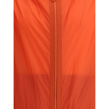 Detail view of Moncler x Donald Glover Red Nylon Shell Jacket zipper.