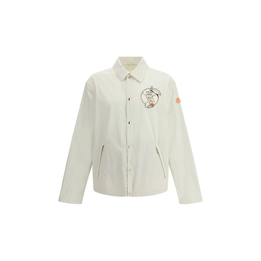 Moncler x Donald Glover White Cotton Coat with comic-style patches and embroidered details showcasing the Moncler mascot.