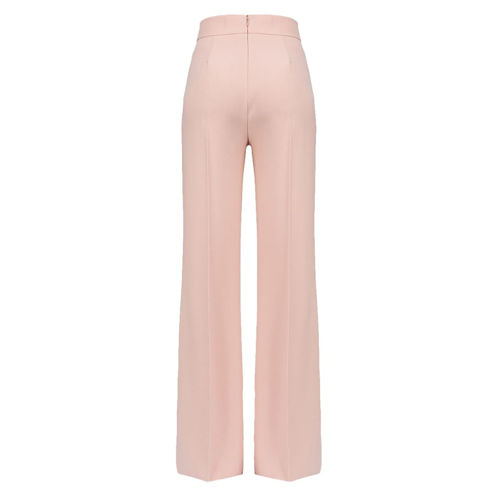 Back view of PINKO Pink Polyester Women's Trouser with high waist and offset leg cut.