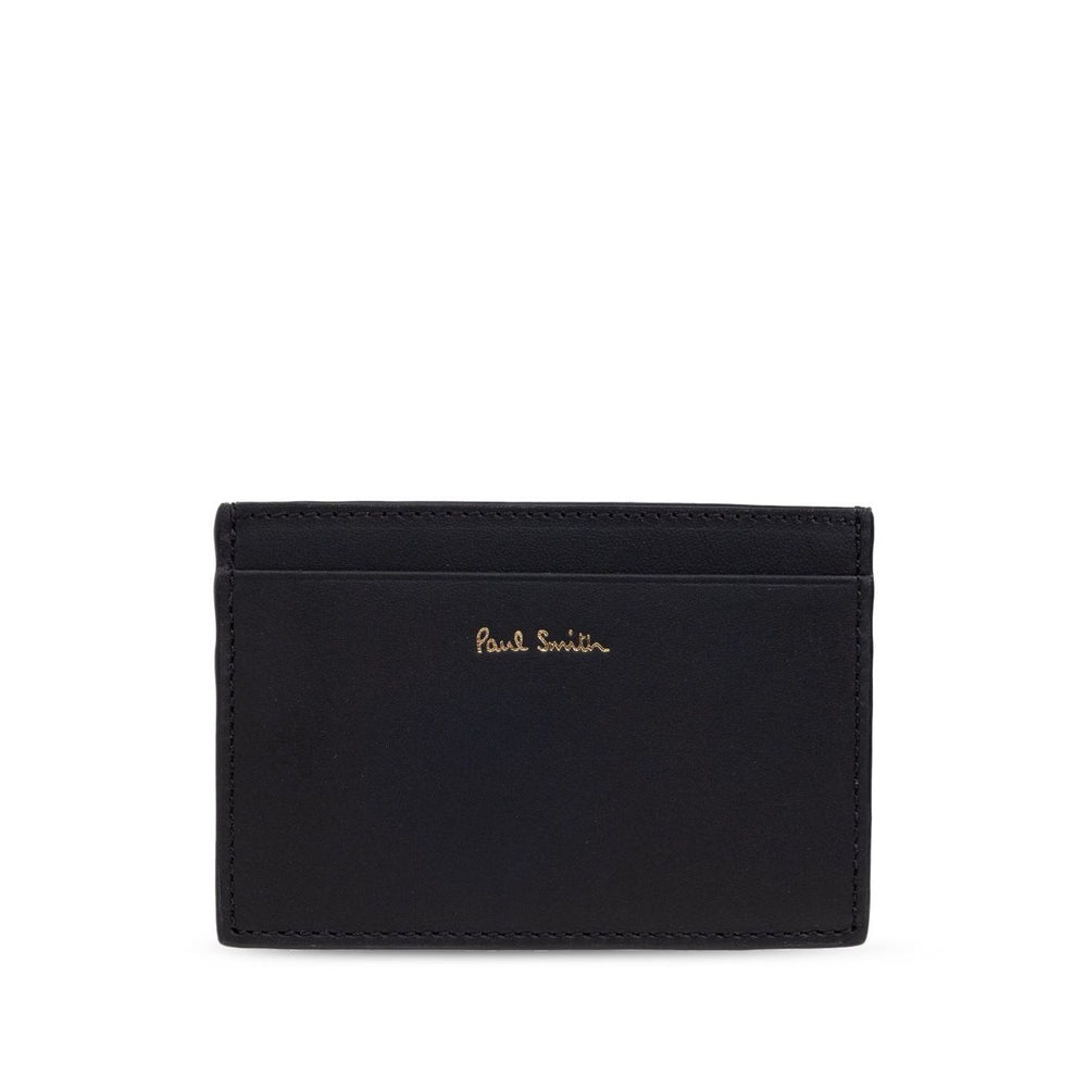 Paul Smith Signature Stripe leather card case, black with logo stamp and card slots, showcasing elegant design and quality leather.