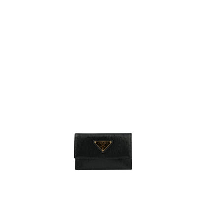 Prada Black Calfskin Cardholder with front logo plaque and flap top button closure, made of 100% calf leather for women.