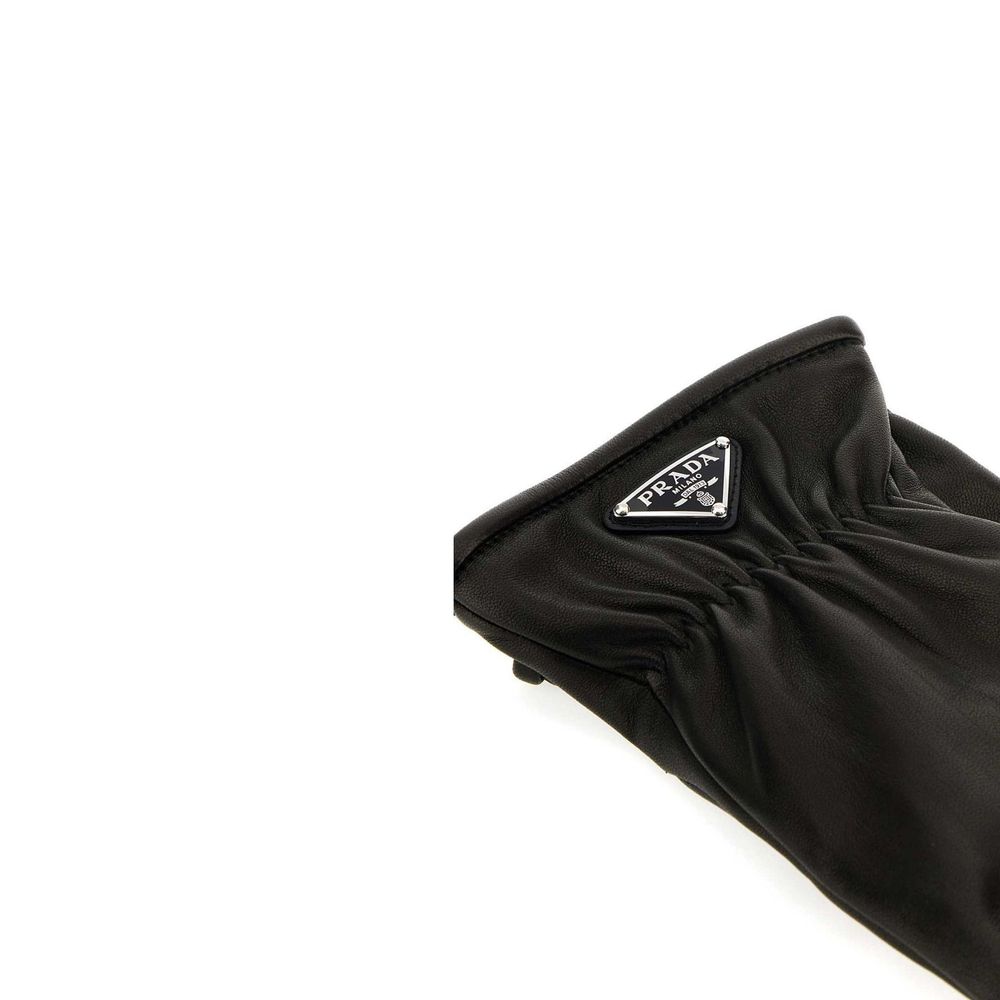Prada Black Lamb Leather Gloves featuring cashmere lining, enamel triangle logo, and elasticated wrist, made in Italy for men.