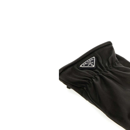Prada Black Lamb Leather Gloves featuring cashmere lining, enamel triangle logo, and elasticated wrist, made in Italy for men.