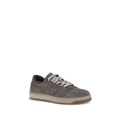 Prada Gray Calf Leather Bos Taurus Low Top Sneakers in suede leather with lace-up closure, featuring a flat sole and rounded toe design.