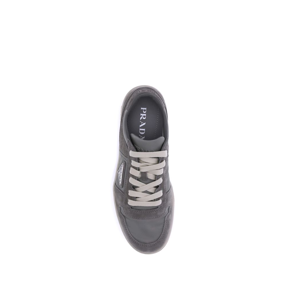 Top view of Prada Gray Calf Leather Bos Taurus Low Top Sneakers with suede texture and lace-up closure.