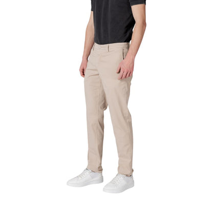 Man wearing Replay Beige Cotton Casual Pants for a stylish and comfortable look.