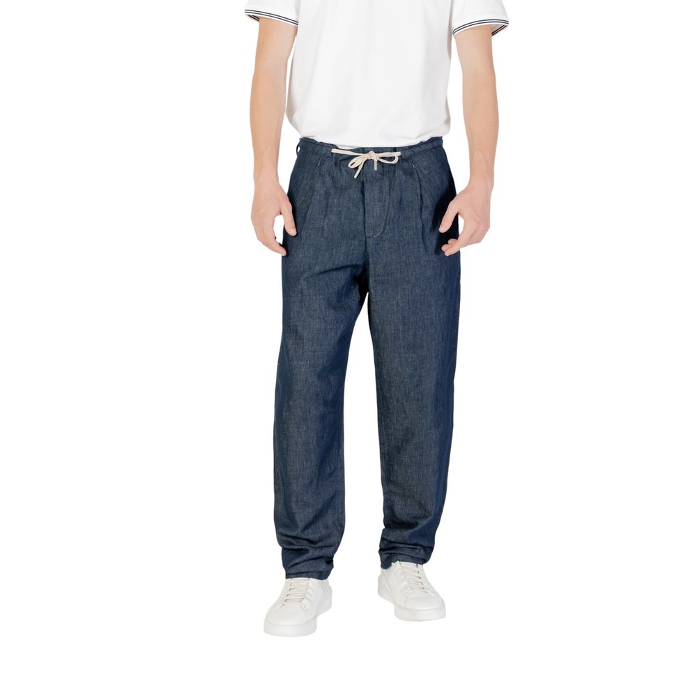 Man wearing Replay Blue Cotton Casual Pants with adjustable drawstring waist for a stylish and breathable fit.