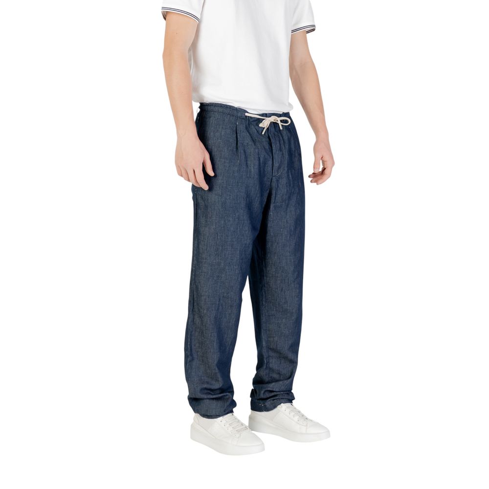Man wearing Replay Blue Cotton Casual Pants with a drawstring waist and comfortable fit, made of cotton and linen blend for versatile occasions.