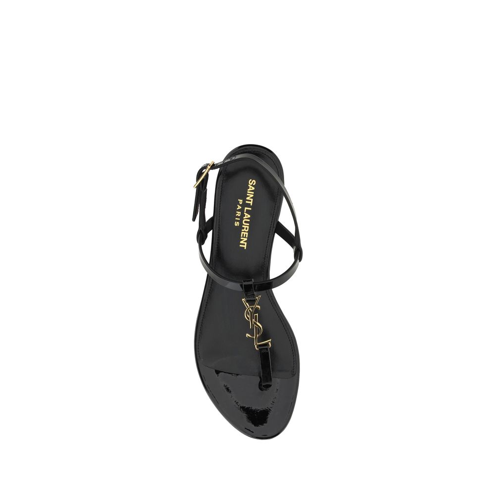 Top view of Saint Laurent Black Calf Leather Bos Taurus Flat Sandals with ankle strap and monogram detail, made in Italy.