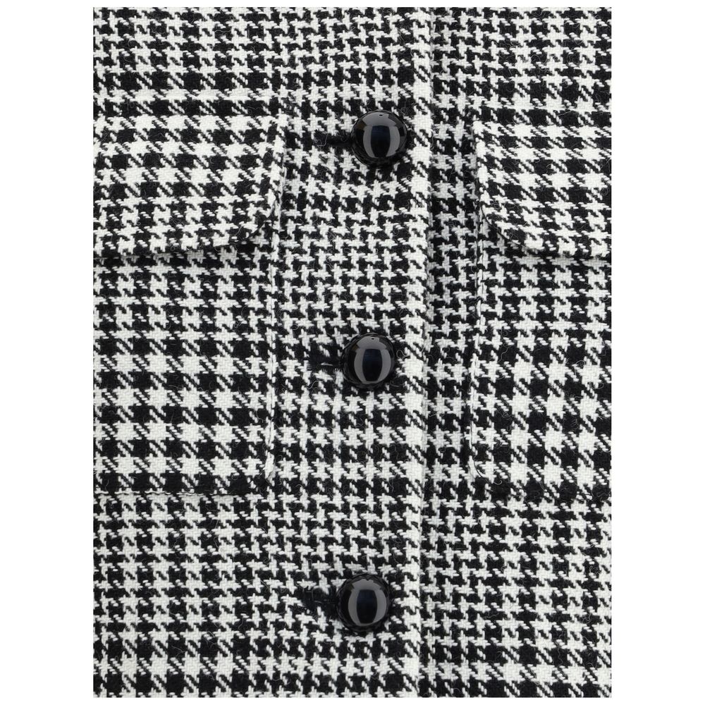 Close-up of Self-Portrait Check Blazer with button closure and elegant check pattern, featuring polyester and wool blend composition.