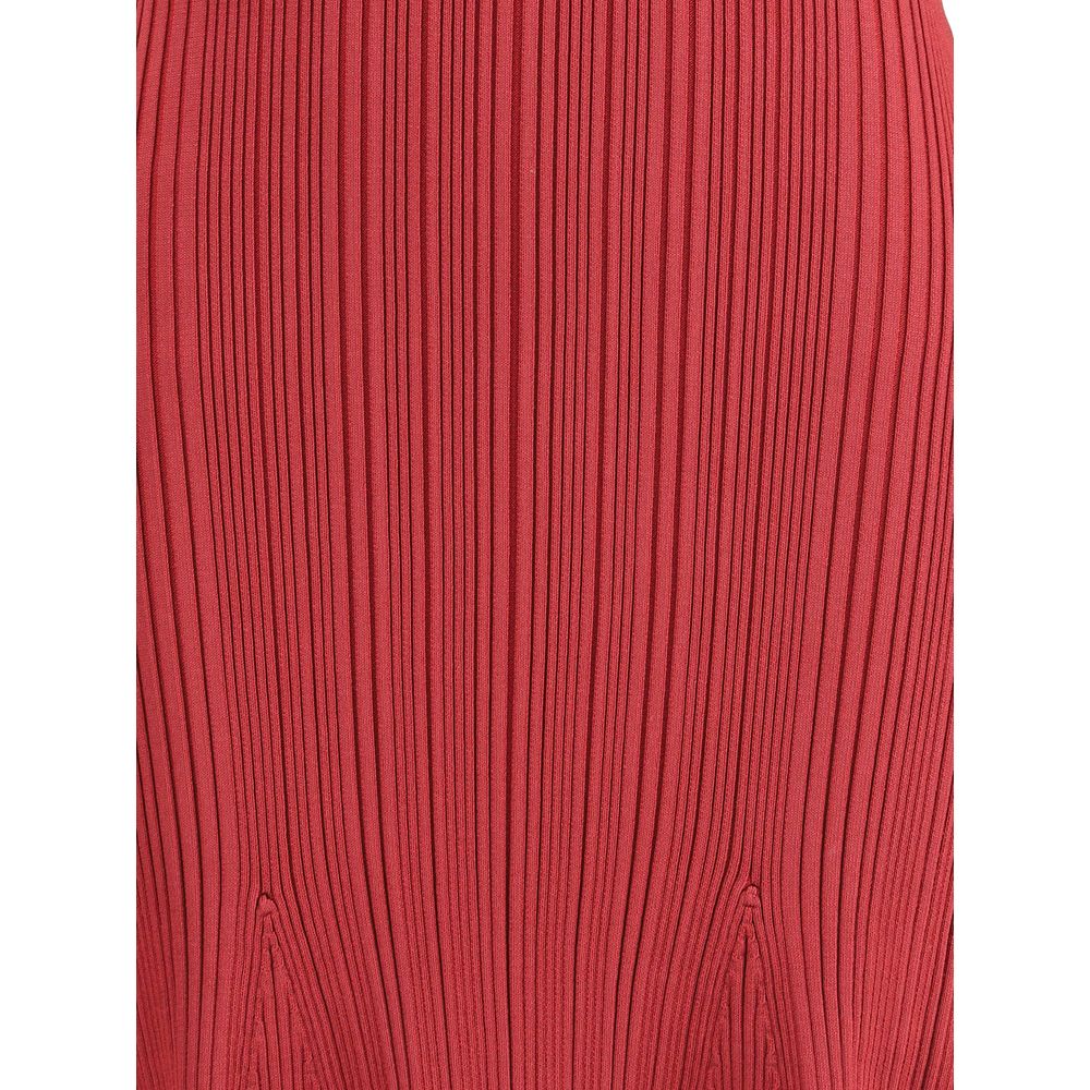 Close-up of Self-Portrait Red Viscose Casual Dress fabric showcasing ribbed burgundy knit texture and soft silhouette-enhancing design.