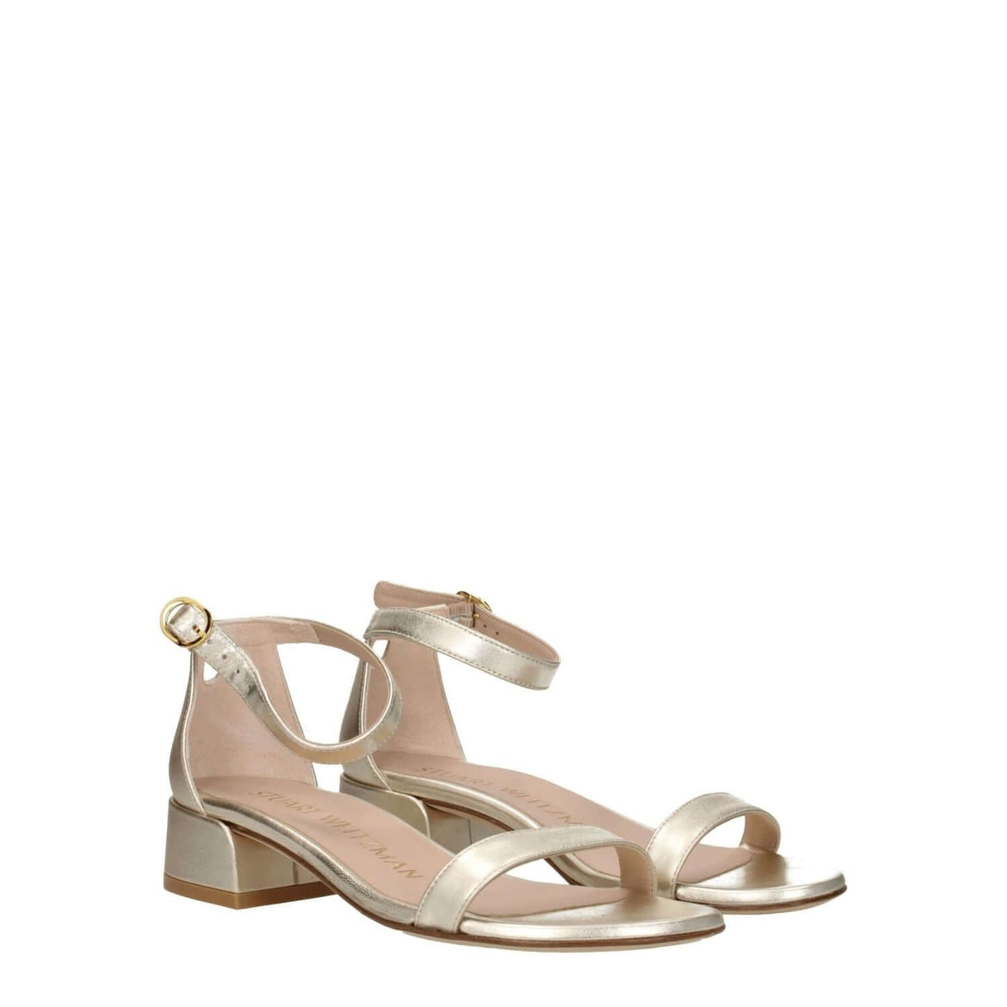 Stuart Weitzman Gold Leather Sandals with buckle closure, mid heels, open toe design, metallic platinum, perfect for casual wear.