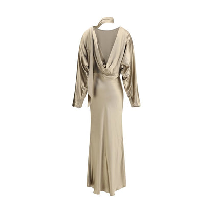 Back view of The Andamane Gold Viscose Casual Dress with boat neckline, deep back slit, and satin scarf, long sleeves, and flowing skirt.