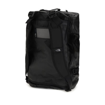 The North Face Black Nylon Luggage And Travel duffel bag, durable waterproof design, versatile with padded handles for easy carrying.