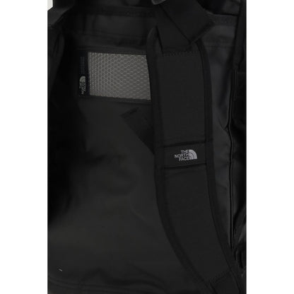 Interior view of The North Face Black Nylon Luggage And Travel, showcasing rugged design and padded handles for versatility.