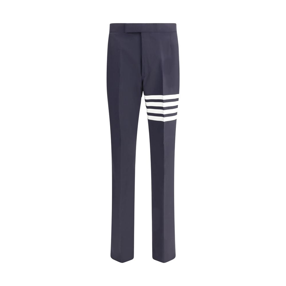 Thom Browne Blue Wool Dress Pants with iconic stripe detail, featuring side slash and back welt pockets, ideal for a formal look.
