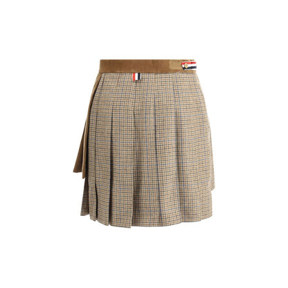 Thom Browne Brown Wool Mini Skirt with pleated design and iconic striped side band, featuring double layer velvet and houndstooth texture.