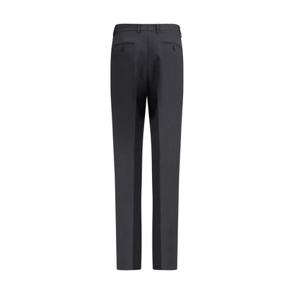 Tom Ford Black Wool Pants featuring high waist, center pleat, and multiple pockets for AW25. Made of fine wool gabardine, mohair, and silk.