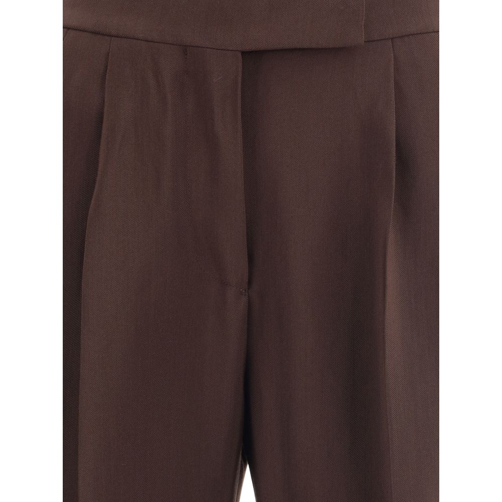 Close-up of Tom Ford Brown Viscose Casual Pants showcasing elegant structure and side buckle detail, made from 76% viscose, 24% wool.