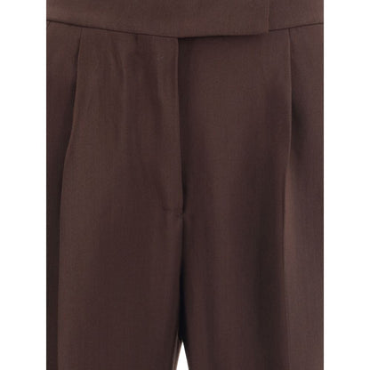 Close-up of Tom Ford Brown Viscose Casual Pants showcasing elegant structure and side buckle detail, made from 76% viscose, 24% wool.