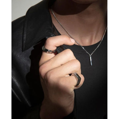 Elegant gentleman wearing VICEROY FASHION Mod. 75382A02400 silver ring, showcased on hand, with necklace and black attire.