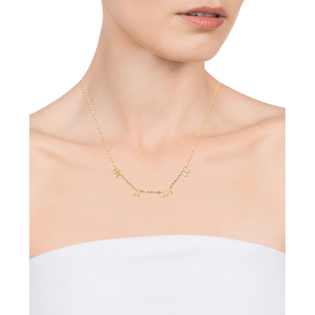 Woman wearing a gold necklace with unique design, showcasing VICEROY JEWELS Mod. 13153C100-00, perfect for elegant occasions.