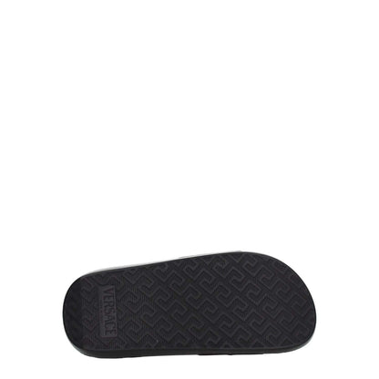 Versace Black Leather Slippers featuring durable rubber sole and embossed Versace logo, open toe design, and casual style.