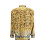 Back view of Versace Silk Cheetah Foulard Shirt with baroque and animal motif, featuring pointed collar and intricate design.
