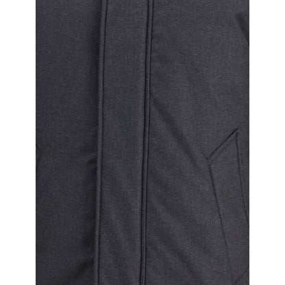 Close-up of Woolrich Black Fleece Wool Parka with side welt pocket and buttoned flap closure, ideal for style and warmth in winter.