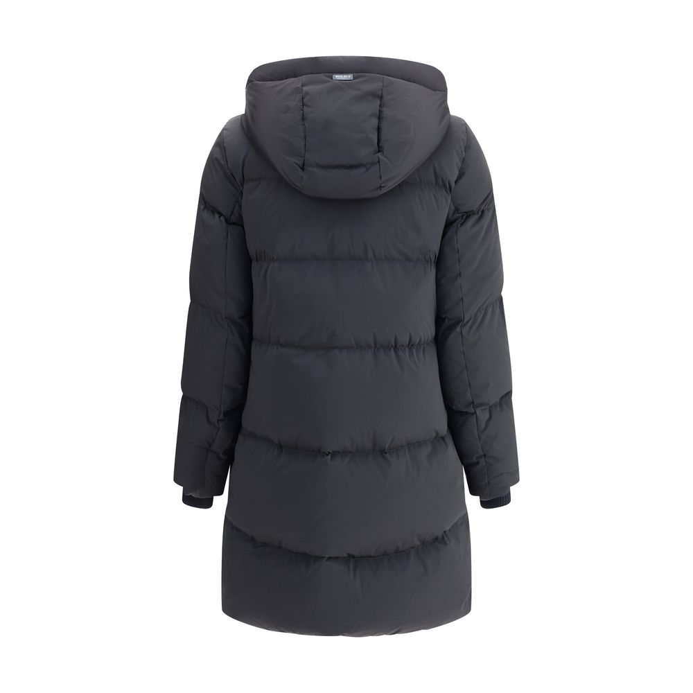 Back view of Woolrich Black Goose Down Coat with hood and elastic cuffs, showcasing padded quilted design for warmth and style.