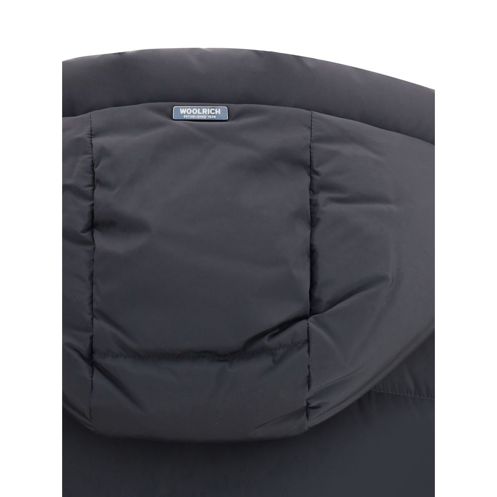 Hood detail of Woolrich Black Goose Down Coat with padded design and brand label.