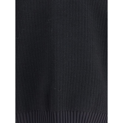 Close-up texture of Y-3 Black Wool Sweatshirt showcasing ribbed design and craftsmanship in high-quality wool fabric.